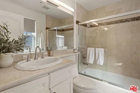 $1,595,000 | 1717 South Barrington Avenue, Unit 103, Los Angeles, CA 90025