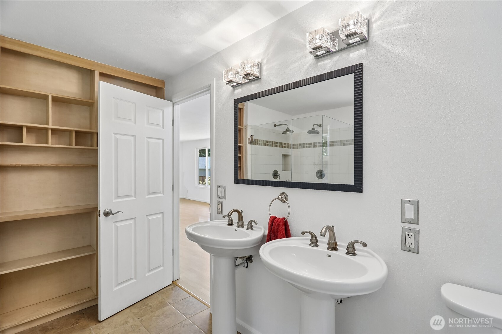 28601 Southeast 225th Street Maple Valley, WA 98038 - Photo 18 of 40 a bathroom with a sink and a mirror
