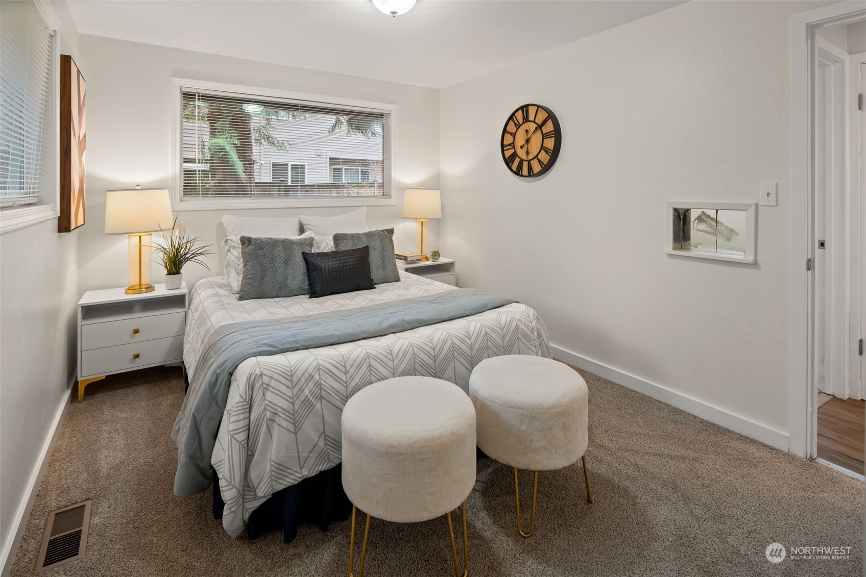 432 170th Place Southwest Bothell, WA 98012 - Photo 13 of 30 a bedroom with a bed and a table in it