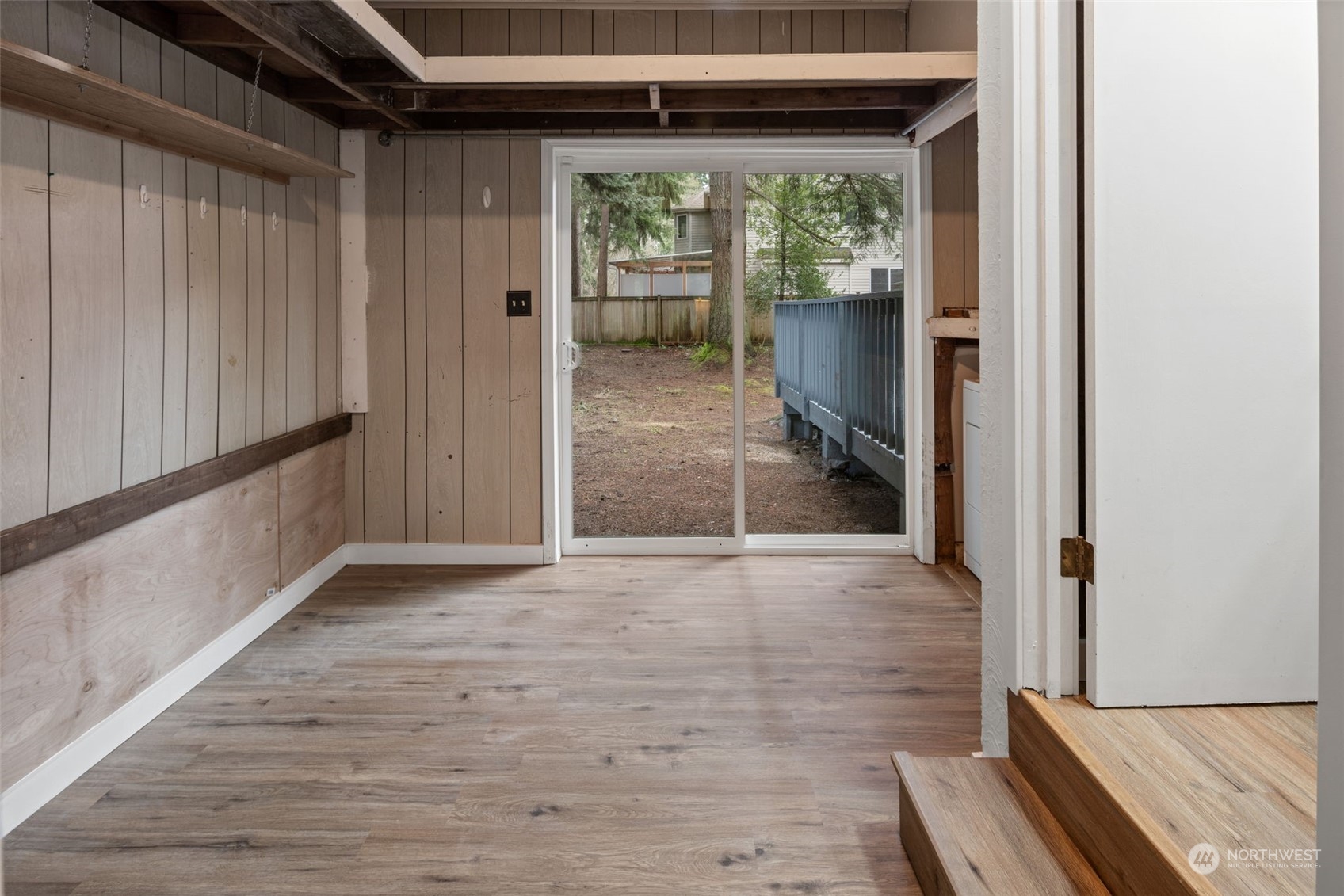 432 170th Place Southwest Bothell, WA 98012 - Photo 21 of 30 a view of an empty room with wooden floor and a window