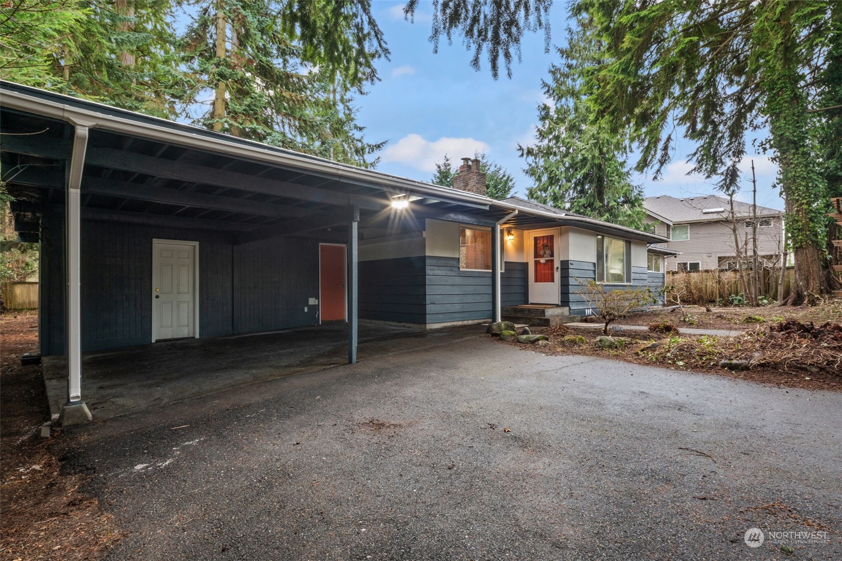 432 170th Place Southwest Bothell, WA 98012 - Photo 27 of 30 a view of a house with a patio and a yard