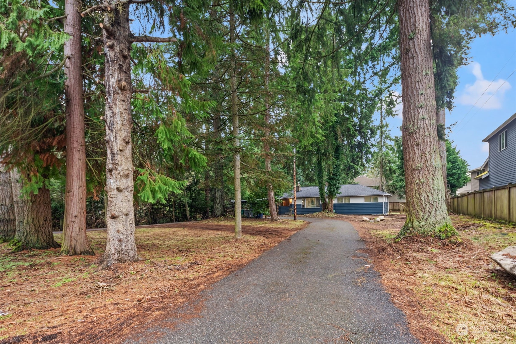 432 170th Place Southwest Bothell, WA 98012 - Photo 29 of 30 a backyard of a house with table and chairs