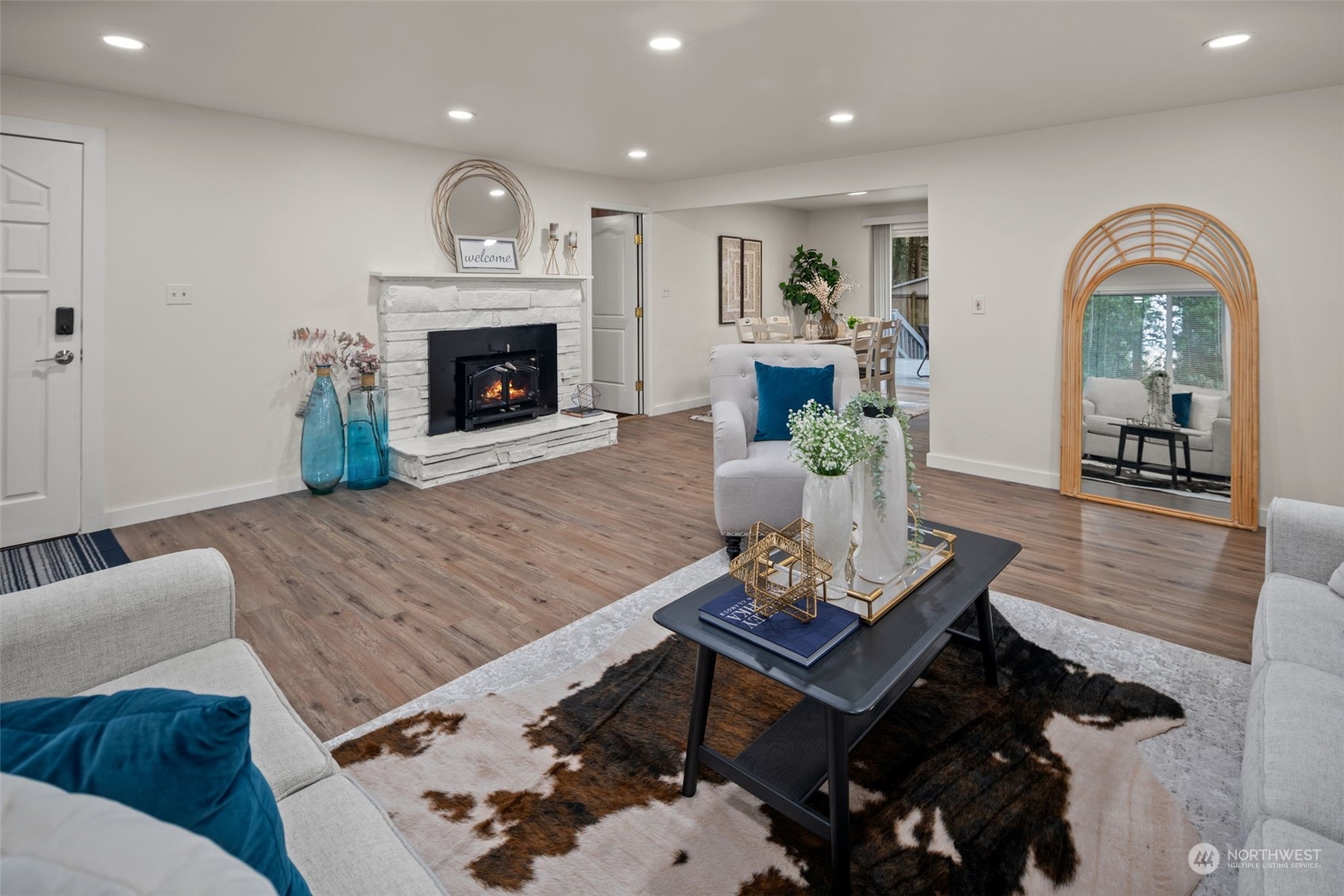 432 170th Place Southwest Bothell, WA 98012 - Photo 6 of 30 a living room with furniture and a fireplace