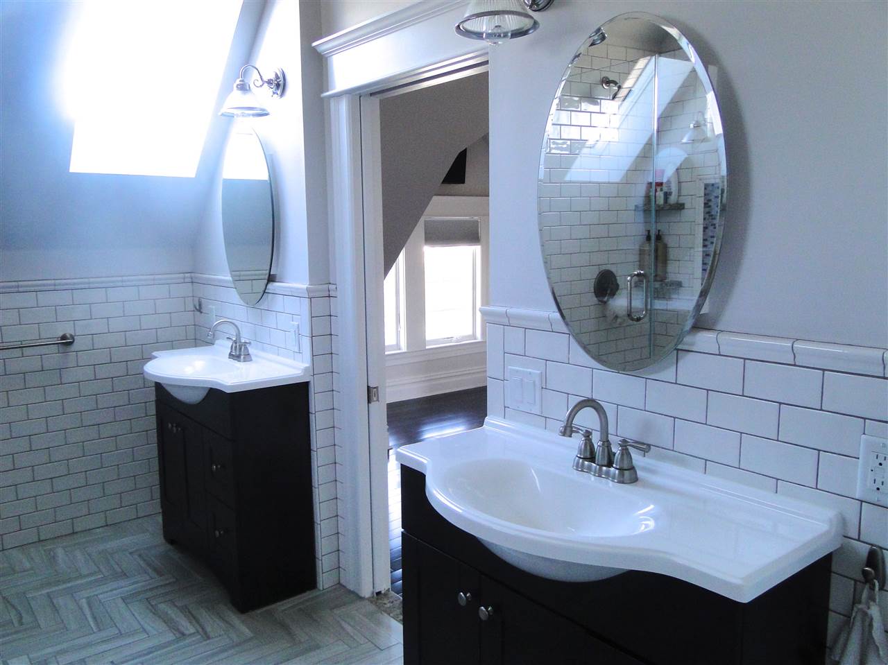 152 Orient Way Rutherford, NJ 07070 - Photo 1 of 1 a bathroom with a sink and a mirror