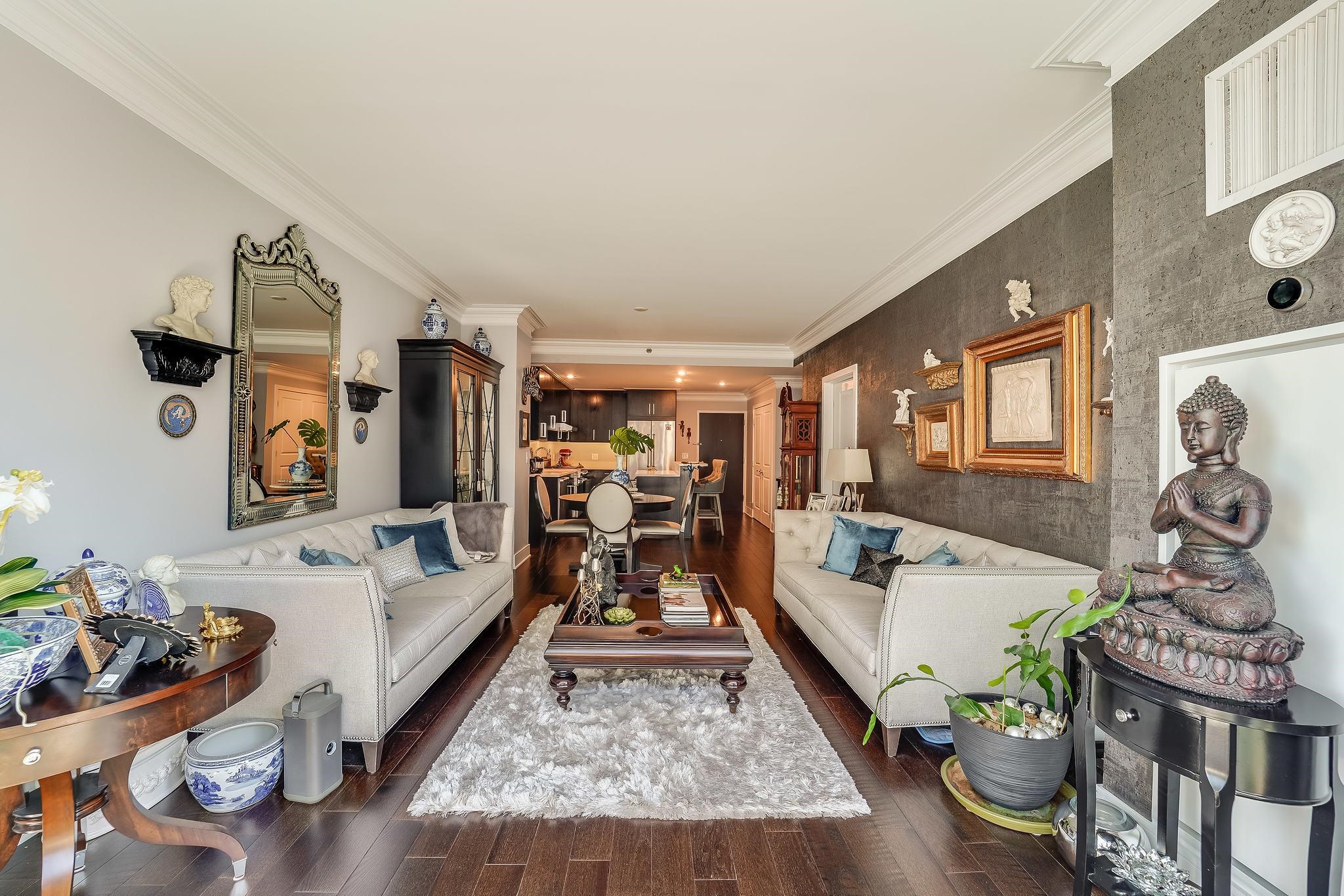 1100 Maxwell Lane, Unit 903 Hoboken, NJ 07030 - Photo 6 of 14 a living room with furniture and a fireplace