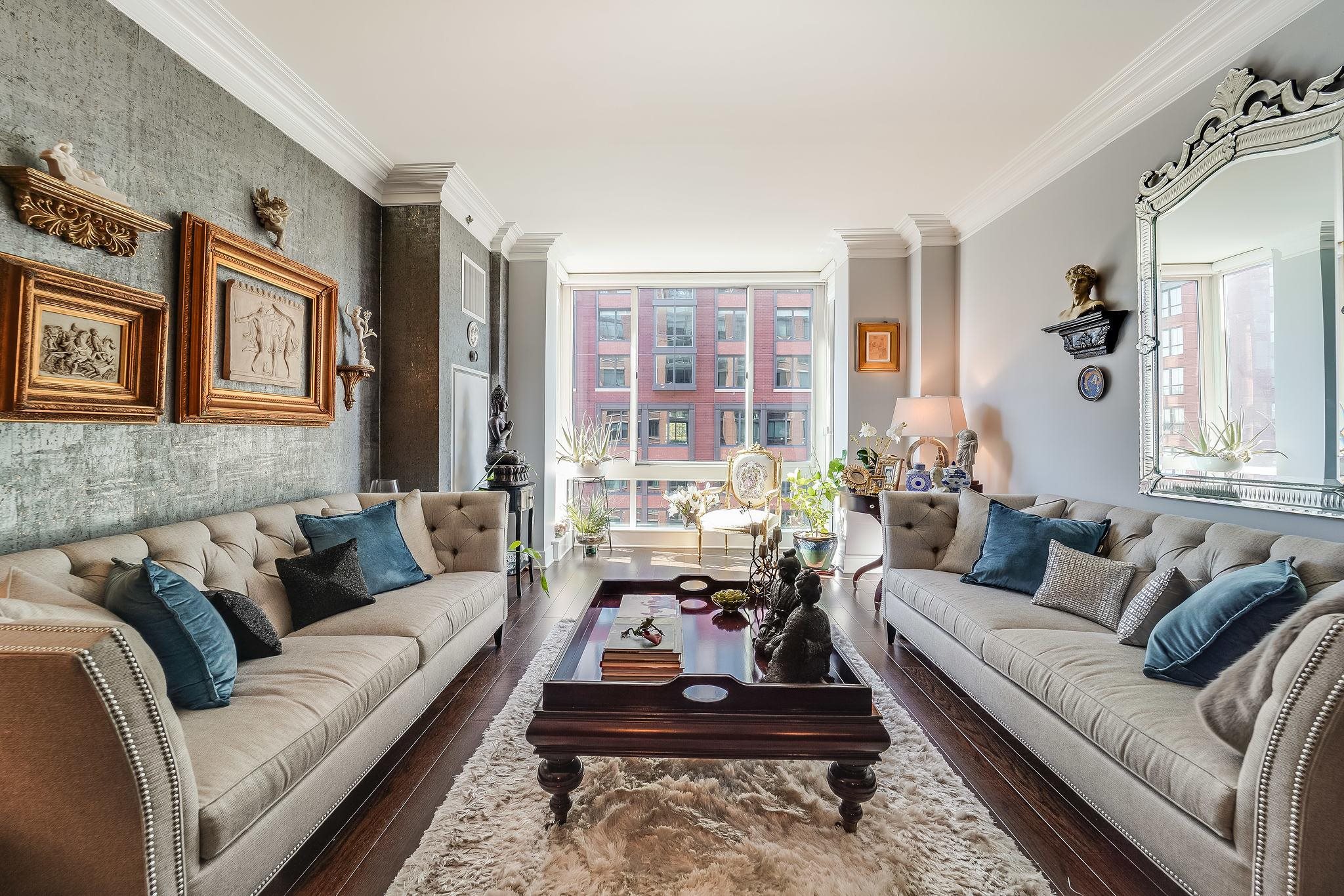 1100 Maxwell Lane, Unit 903 Hoboken, NJ 07030 - Photo 7 of 14 a living room with furniture ceiling fan and a window