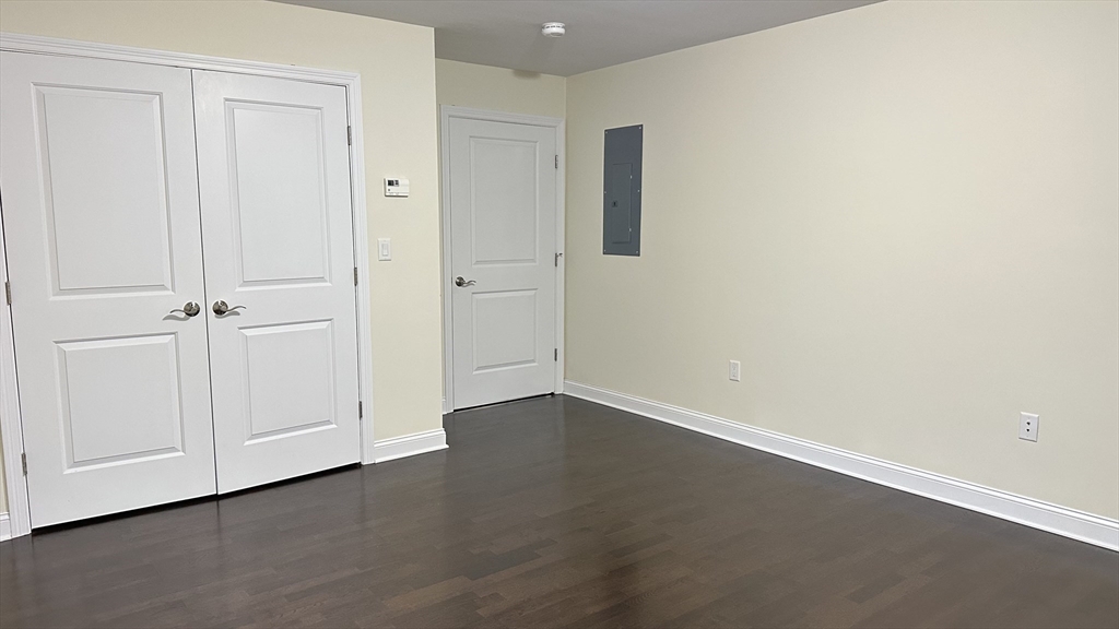 39 Fayette Street, Unit 102 Quincy, MA 02171 - Photo 18 of 24 an empty room with a empty space