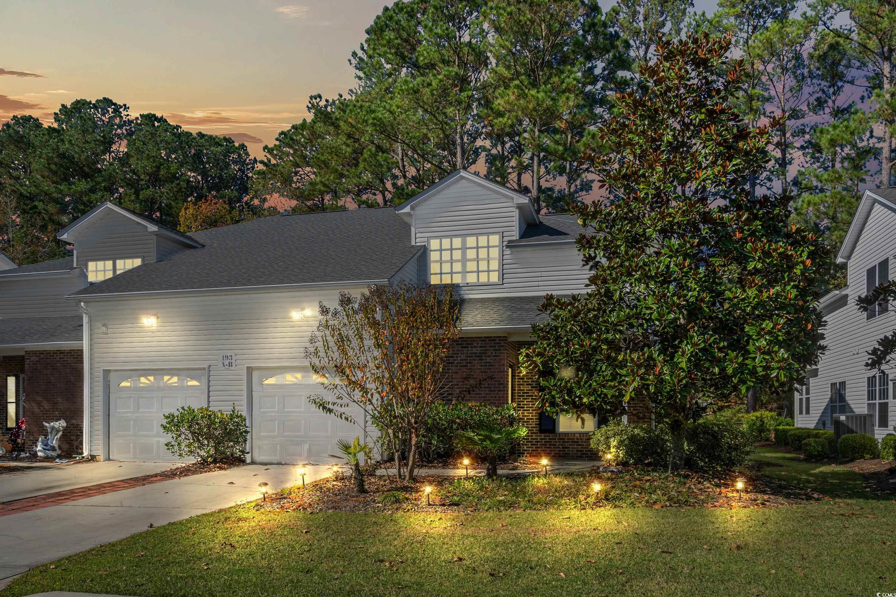 493 Shellbank Drive, Unit 2B Longs, SC 29568 - Photo 1 of 40 View of front of home featuring a garage and a law