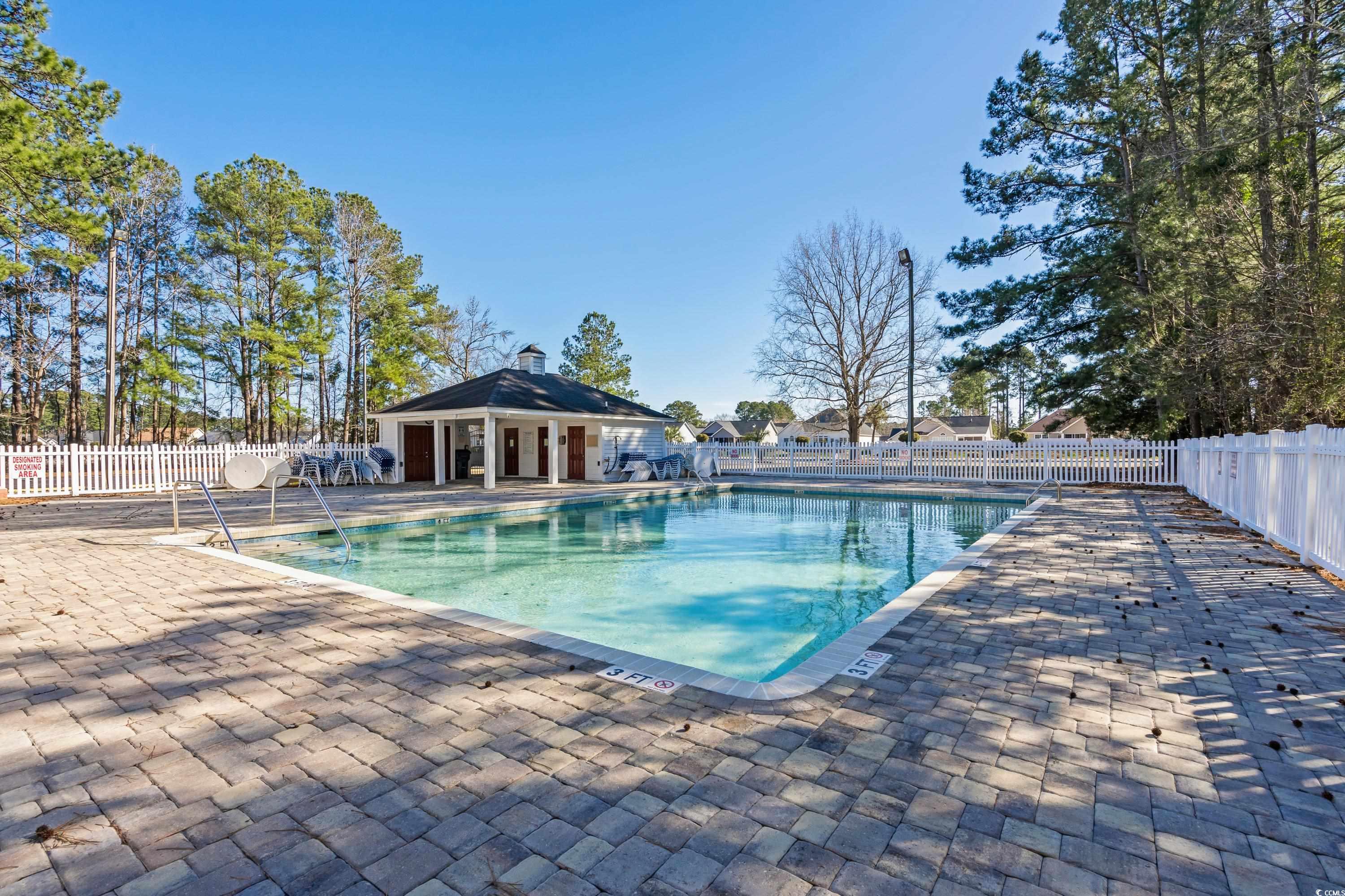 493 Shellbank Drive, Unit 2B Longs, SC 29568 - Photo 17 of 40 View of swimming pool featuring a patio area