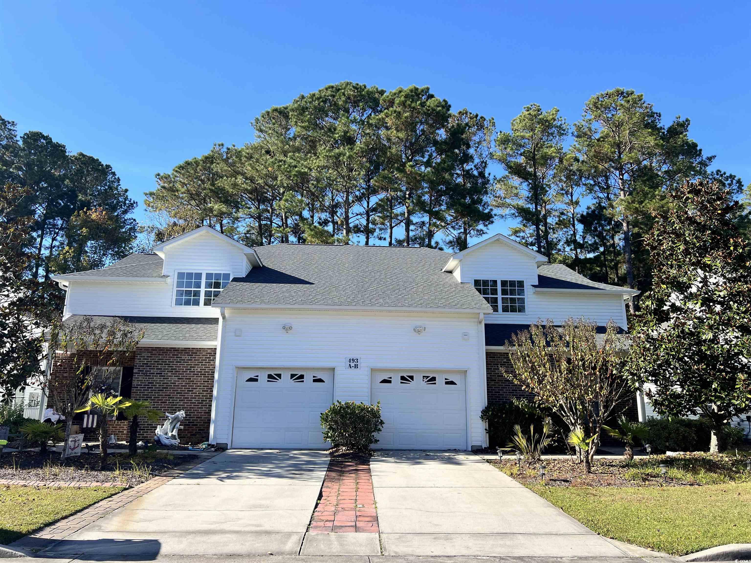 493 Shellbank Drive, Unit 2B Longs, SC 29568 - Photo 3 of 40 View of property featuring a garage