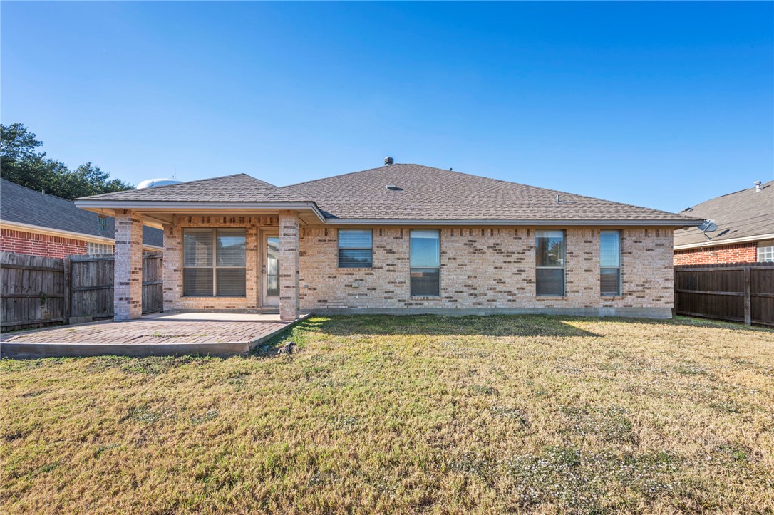 1604 Winfield Court Bryan, TX 77802 - Photo 14 of 14 a front view of a house with swimming pool