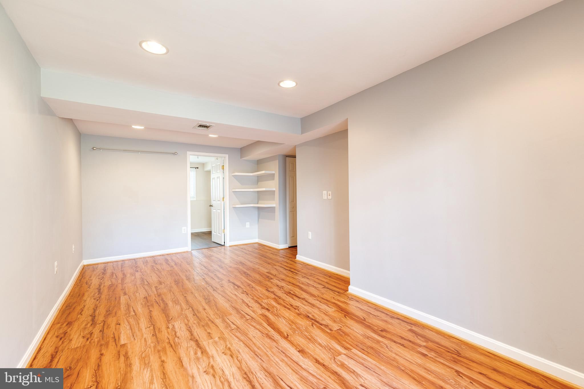 2652 April Dawn Way Gambrills, MD 21054 - Photo 19 of 26 a view of empty room with wooden floor