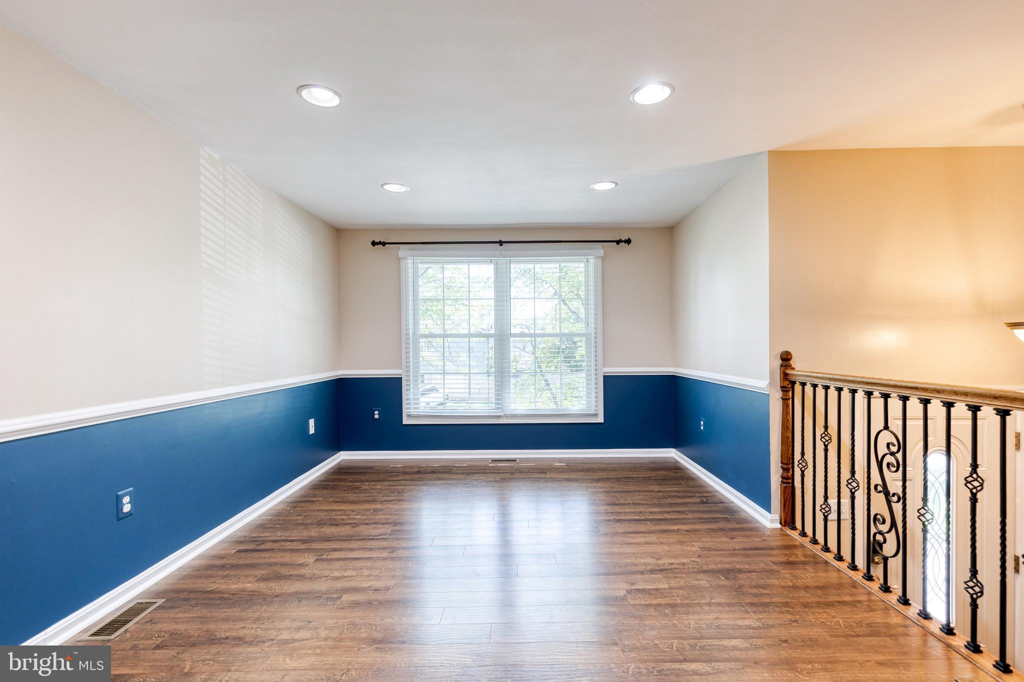 2652 April Dawn Way Gambrills, MD 21054 - Photo 5 of 26 a view of empty room with wooden floor and fan