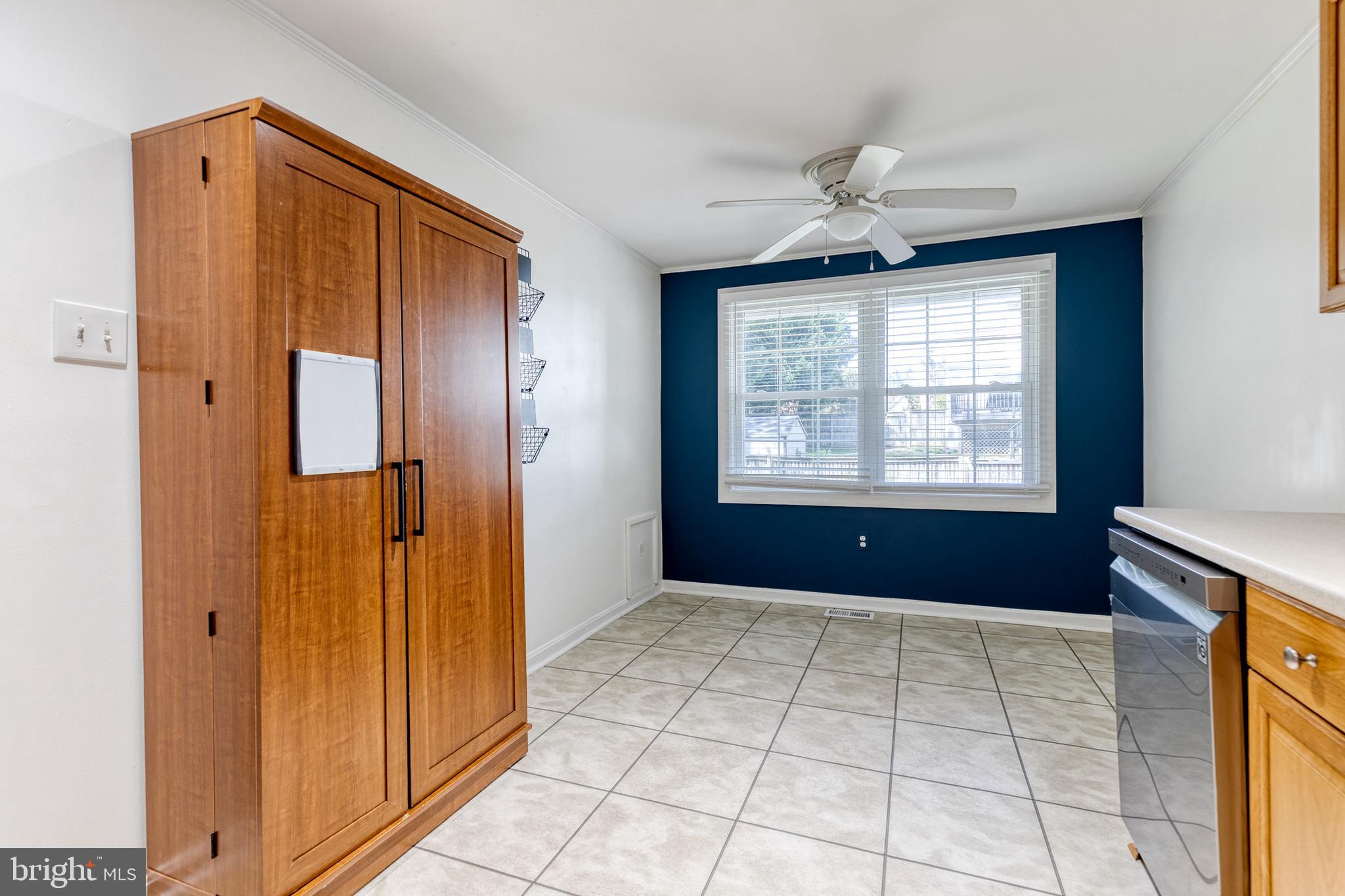 2652 April Dawn Way Gambrills, MD 21054 - Photo 9 of 26 a view of entryway with a ceiling fan and windows