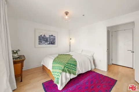 a bathroom with a bathtub and a toilet