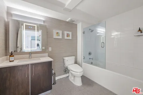 a view of a living room and balcony