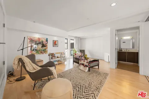 a white toilet next to a bathroom sink