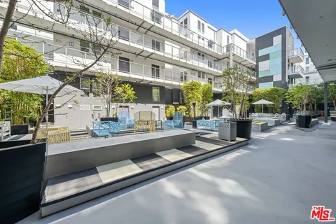 a picture of a building with a lot of trees