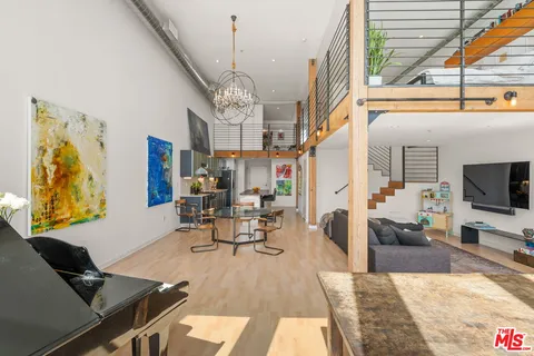 a kitchen with stainless steel appliances granite countertop a stove and a cabinets