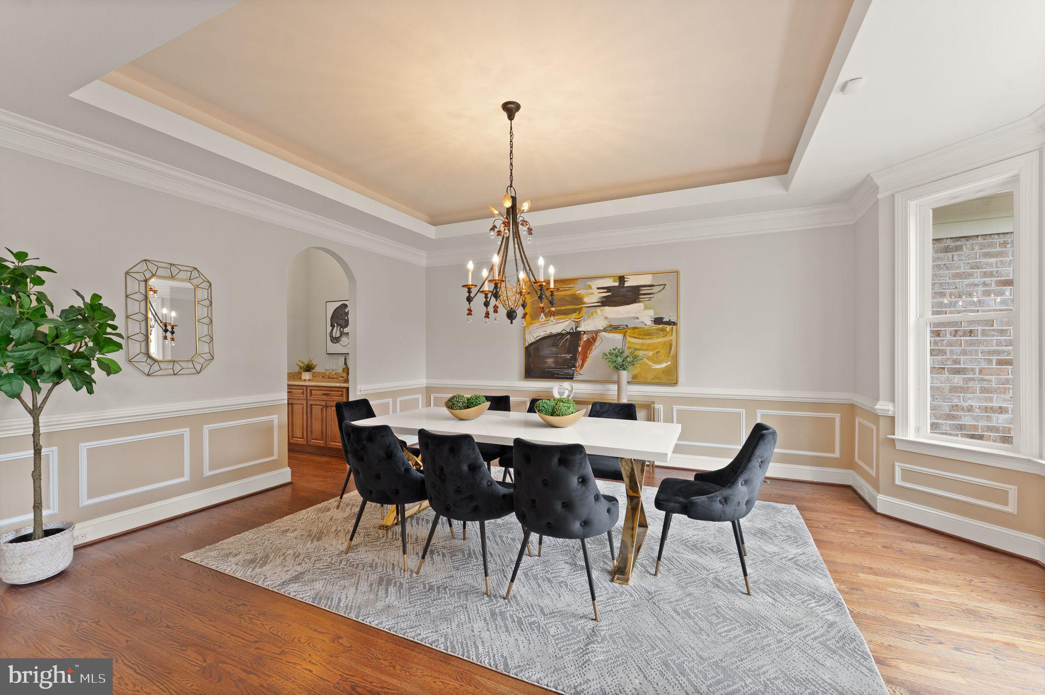 3906 Estel Road Fairfax, VA 22031 - Photo 18 of 122 a view of a dining room with furniture window and wooden floor