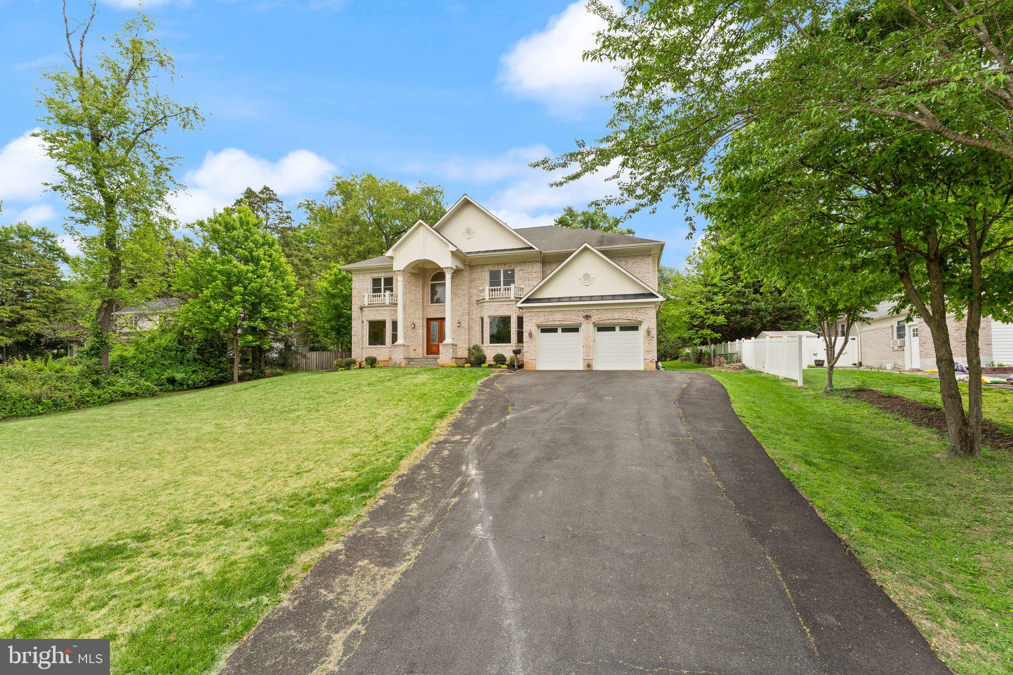 3906 Estel Road Fairfax, VA 22031 - Photo 2 of 122 a house with garden in front of it