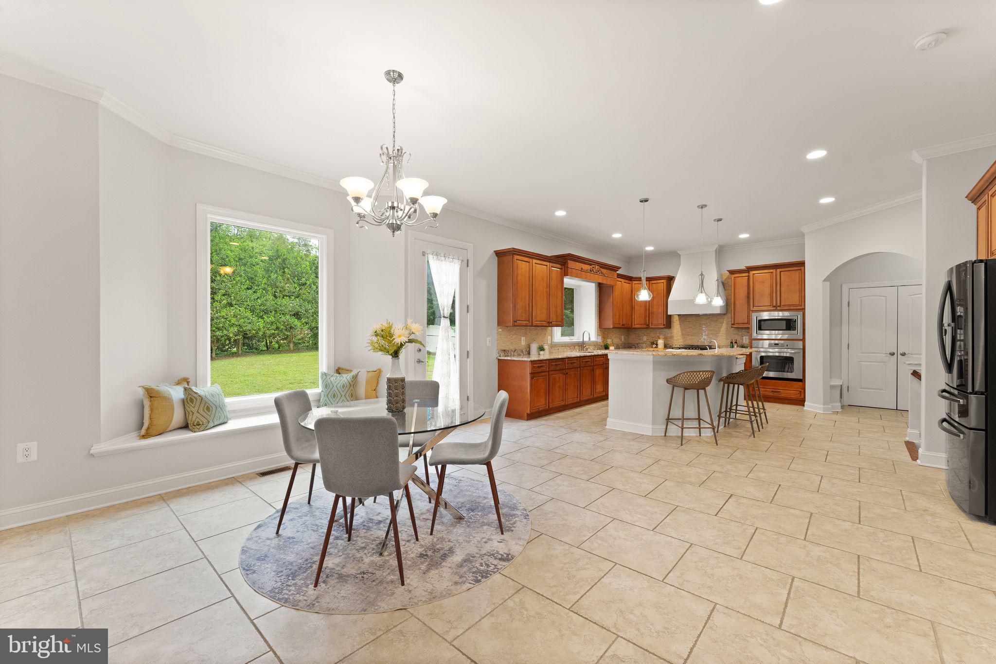 3906 Estel Road Fairfax, VA 22031 - Photo 31 of 122 a view of a dining room with furniture window and outside view