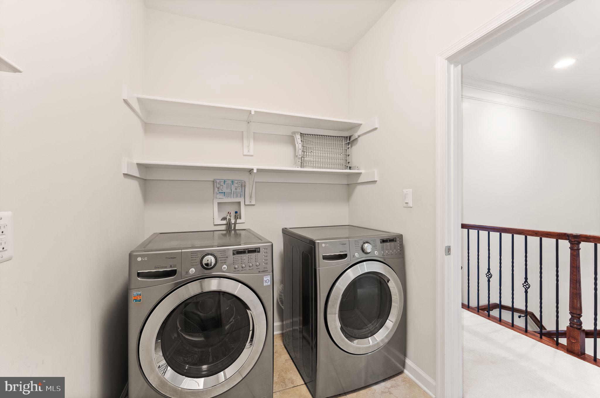 3906 Estel Road Fairfax, VA 22031 - Photo 85 of 122 a view of storage and utility room with washer and dryer
