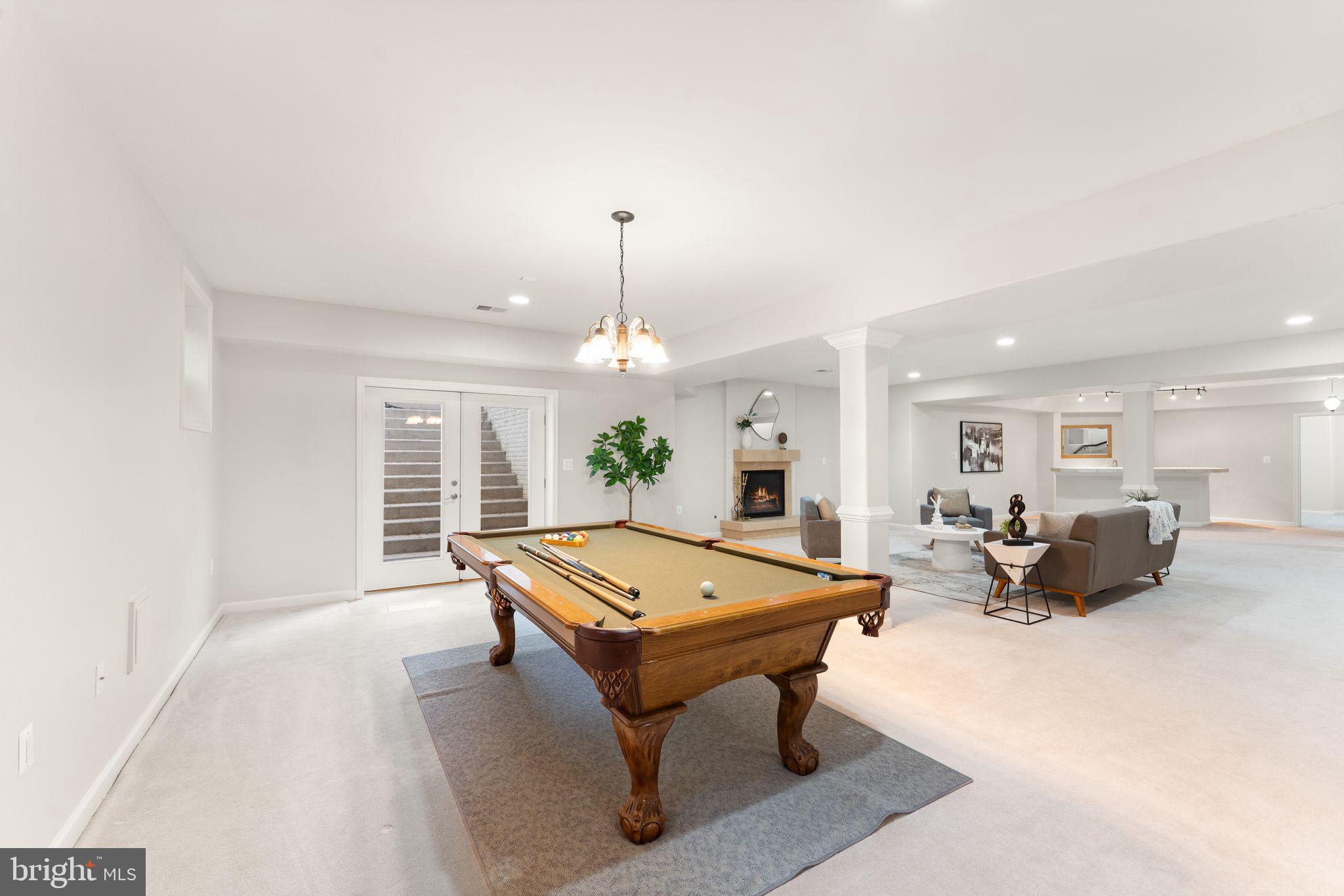 3906 Estel Road Fairfax, VA 22031 - Photo 96 of 122 a living room with furniture pool table and a window