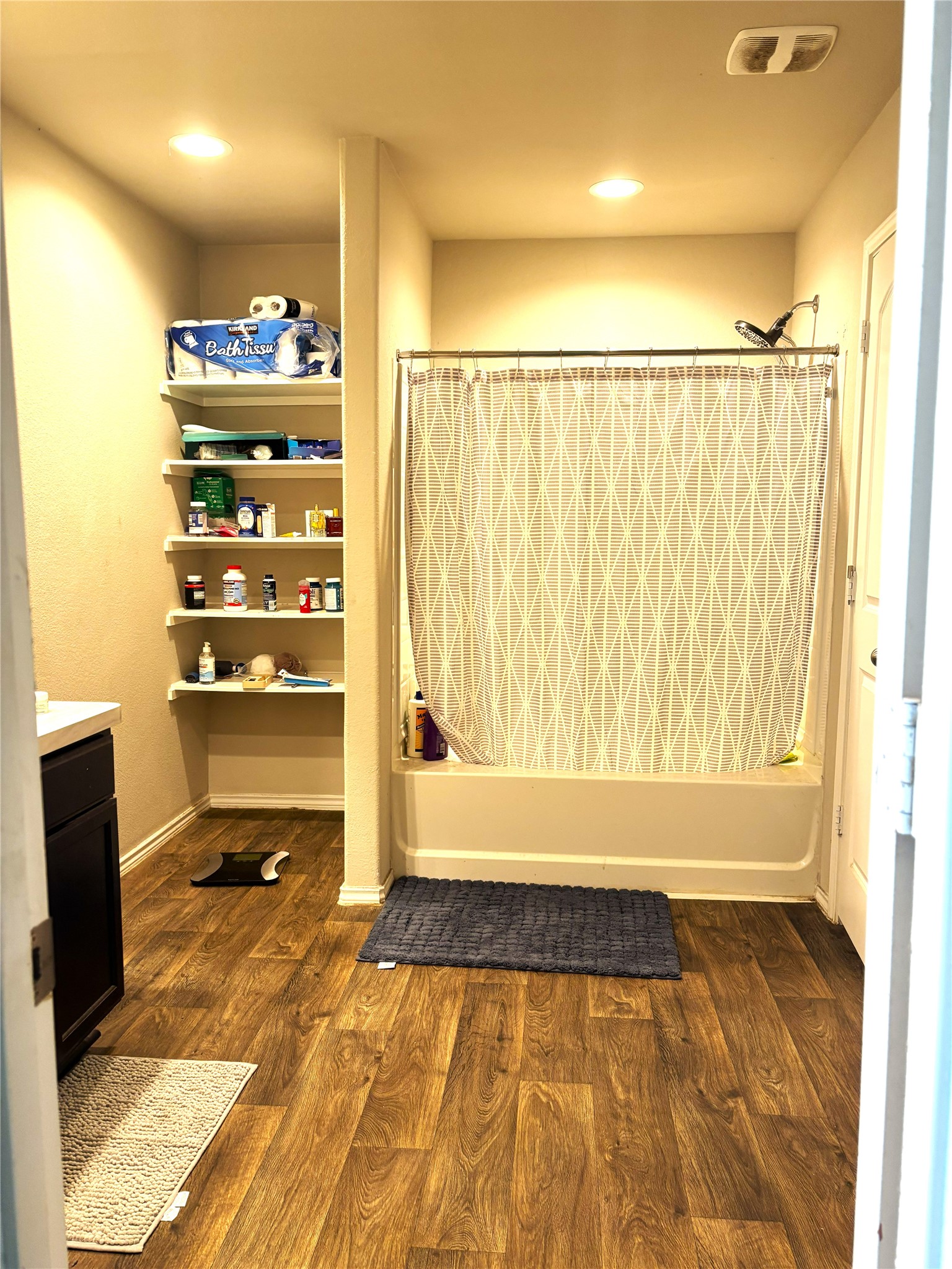 1210 Roca Rigida Trail Channelview, TX 77530 - Photo 12 of 14 a bathroom with a bathtub and a shower