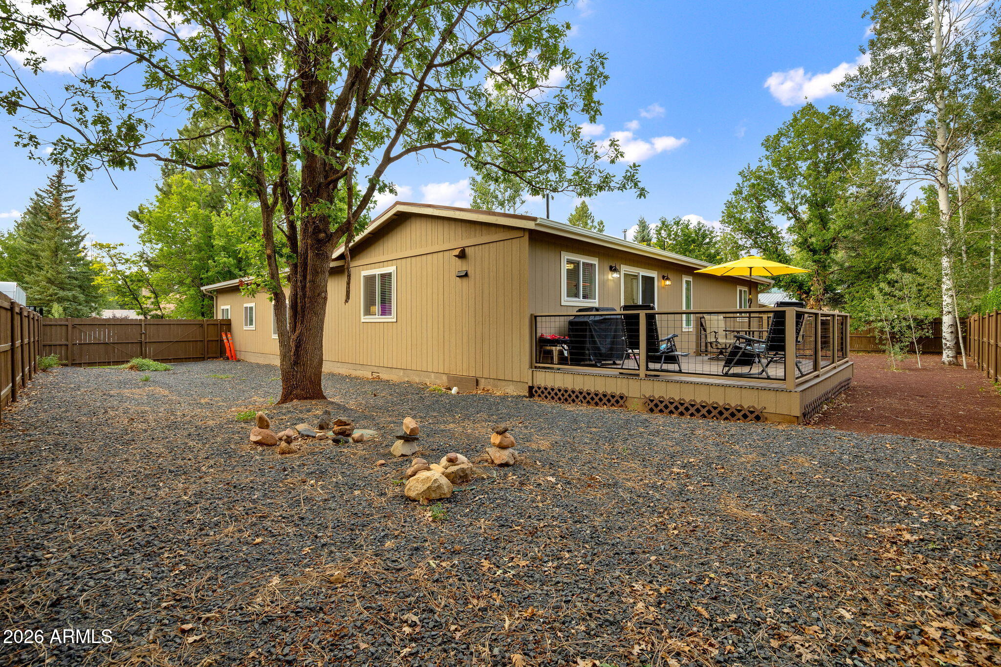 5145 Drifting Snow Loop Pinetop, AZ 85935 - Photo 25 of 37 a front view of a house with a yard