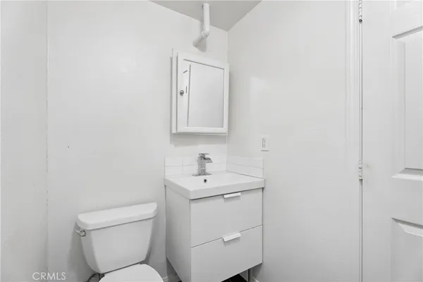 a bathroom with a shower and vanity