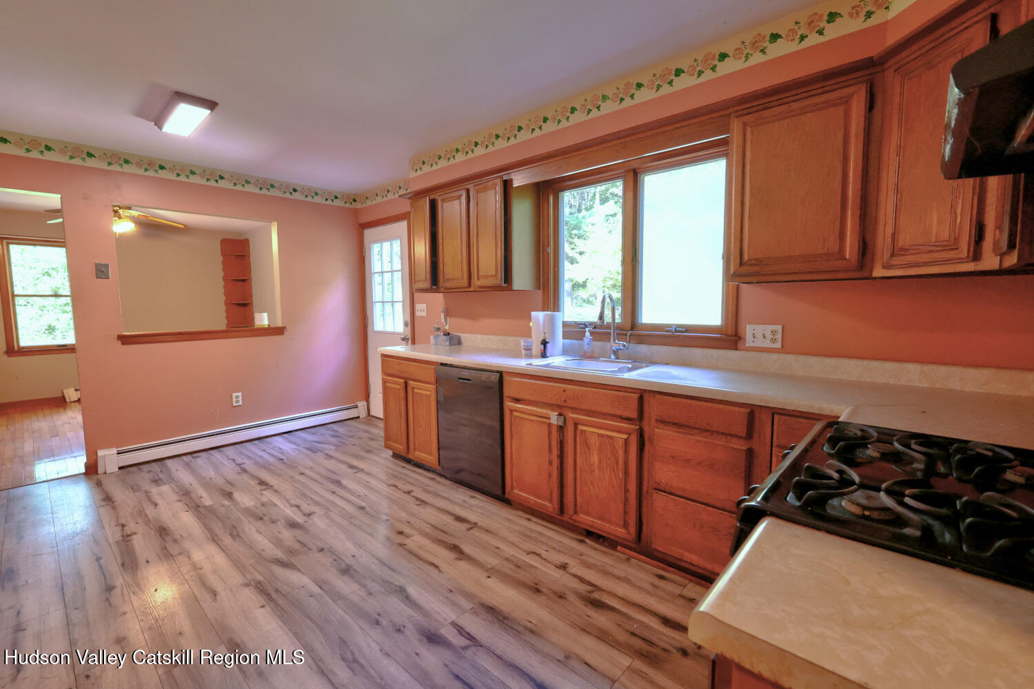 70 Horseneck Road Freehold, NY 12431 - Photo 11 of 70 a kitchen with stainless steel appliances granite countertop a sink stove and cabinets
