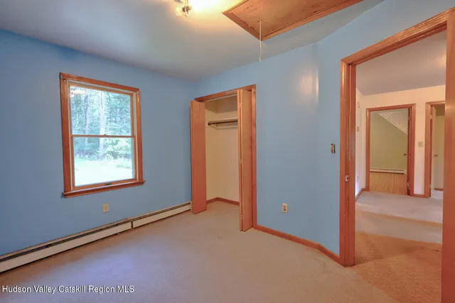 a view of a trees in front of a house