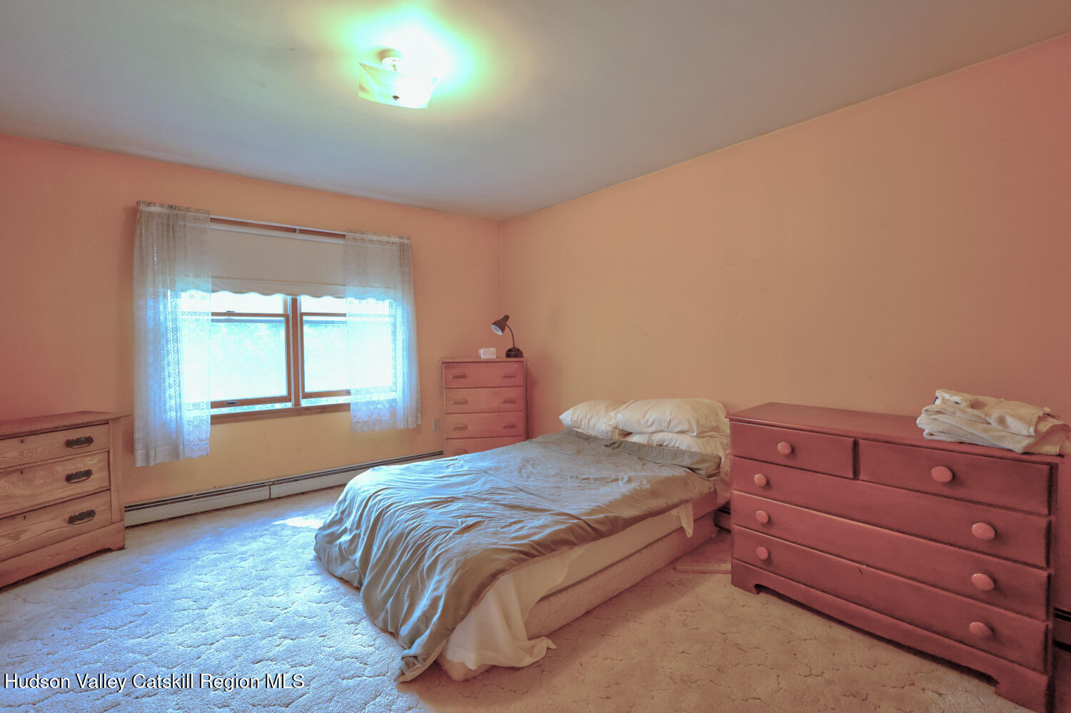 70 Horseneck Road Freehold, NY 12431 - Photo 40 of 70 a bedroom with a bed and window