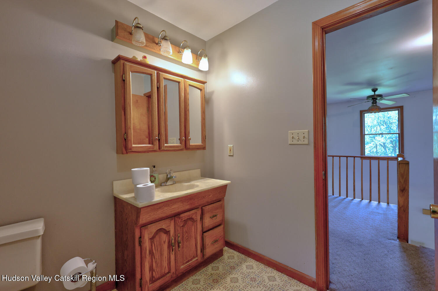 70 Horseneck Road Freehold, NY 12431 - Photo 44 of 70 a bathroom with a sink and a mirror