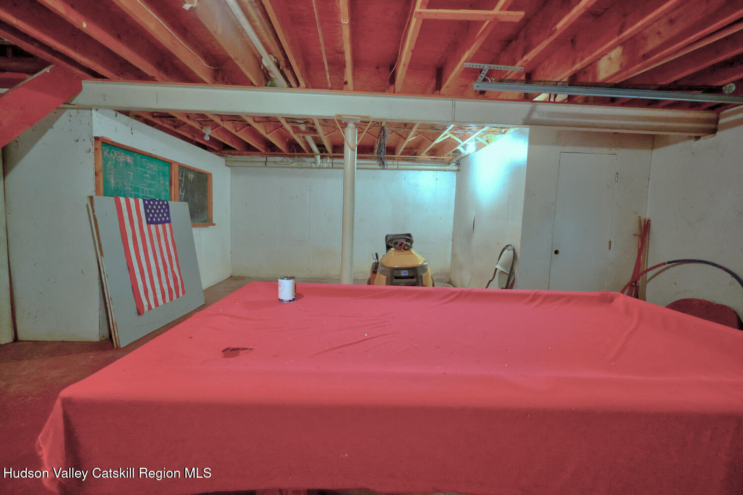 70 Horseneck Road Freehold, NY 12431 - Photo 46 of 70 a bedroom with a bed and a mirror