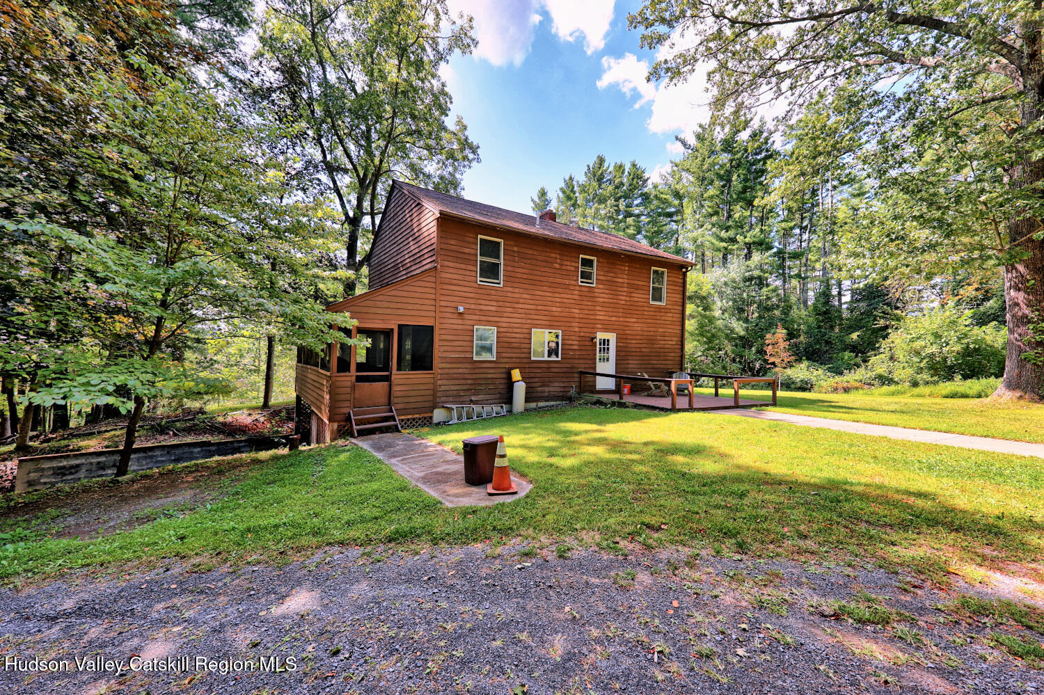70 Horseneck Road Freehold, NY 12431 - Photo 68 of 70 a view of a house with backyard porch and sitting area