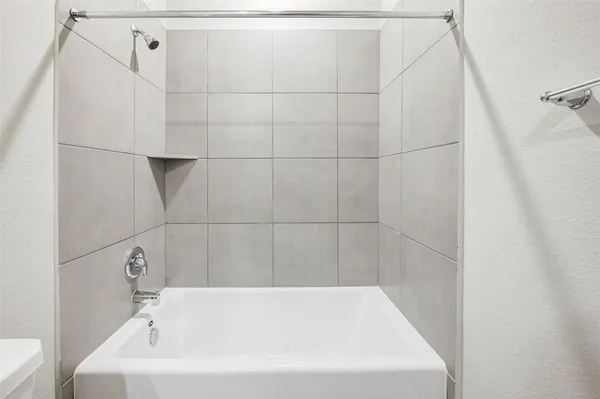 a bathroom with a bathtub