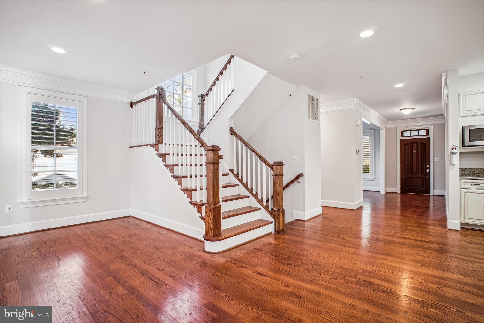 5512 Greentree Road Bethesda, MD 20817 - Photo 26 of 75 a view of entryway and hall with wooden floor