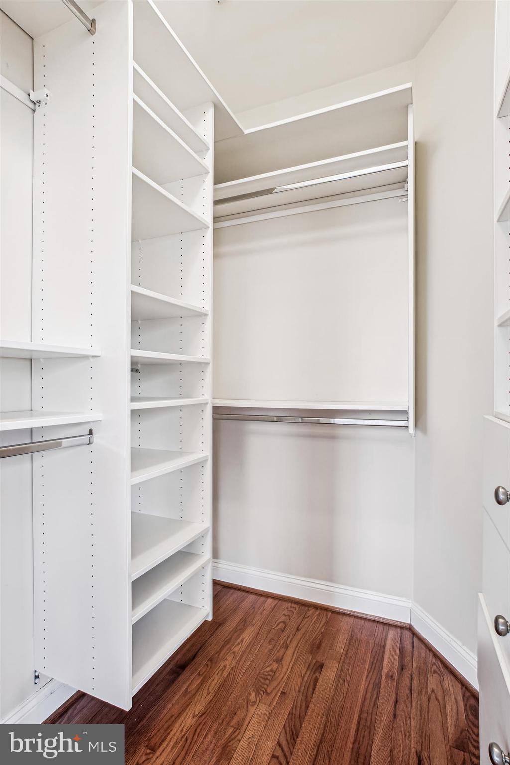 5512 Greentree Road Bethesda, MD 20817 - Photo 41 of 75 a view of walk in closet with empty racks