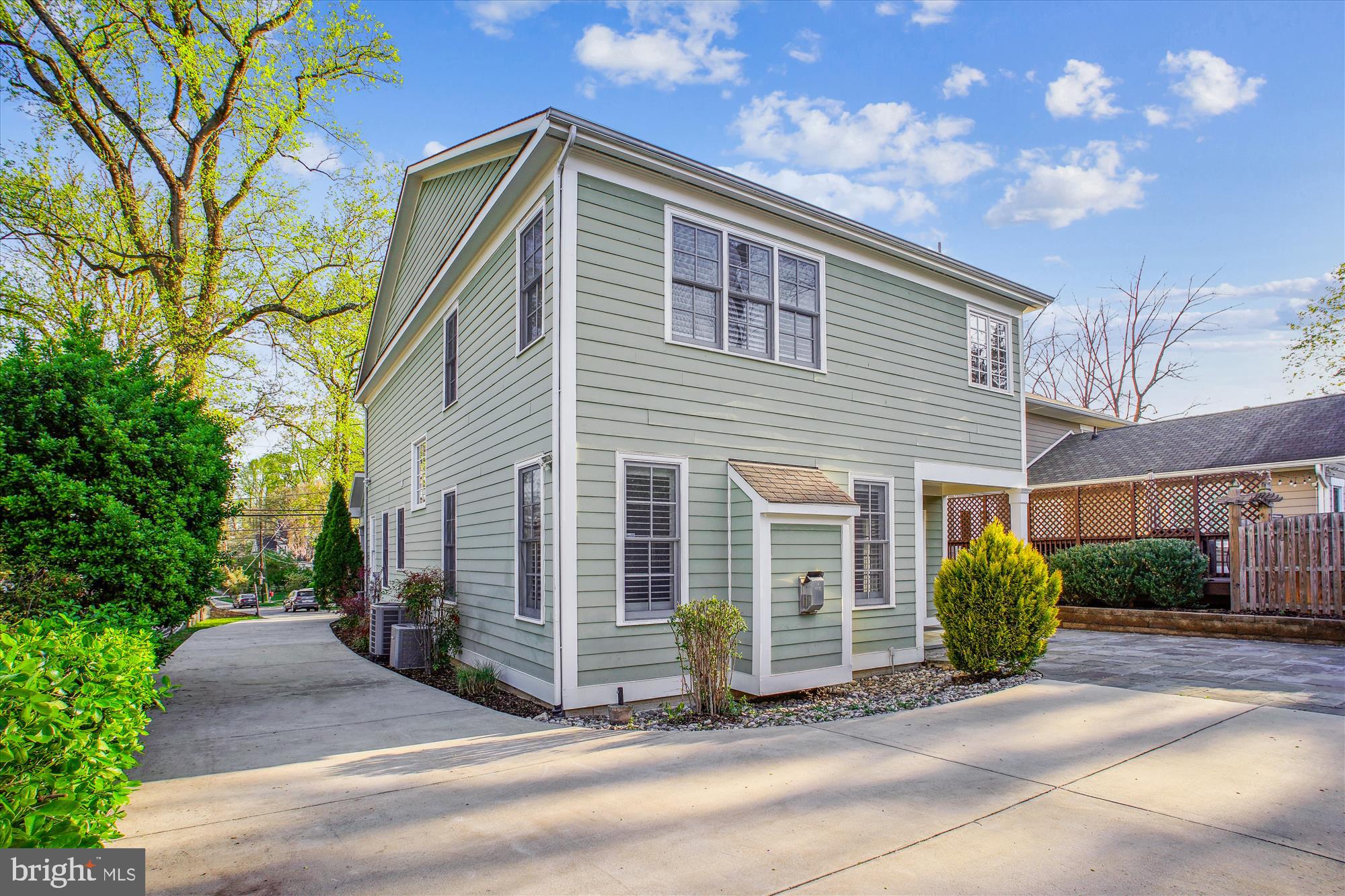 5512 Greentree Road Bethesda, MD 20817 - Photo 63 of 75 a front view of a house with garden