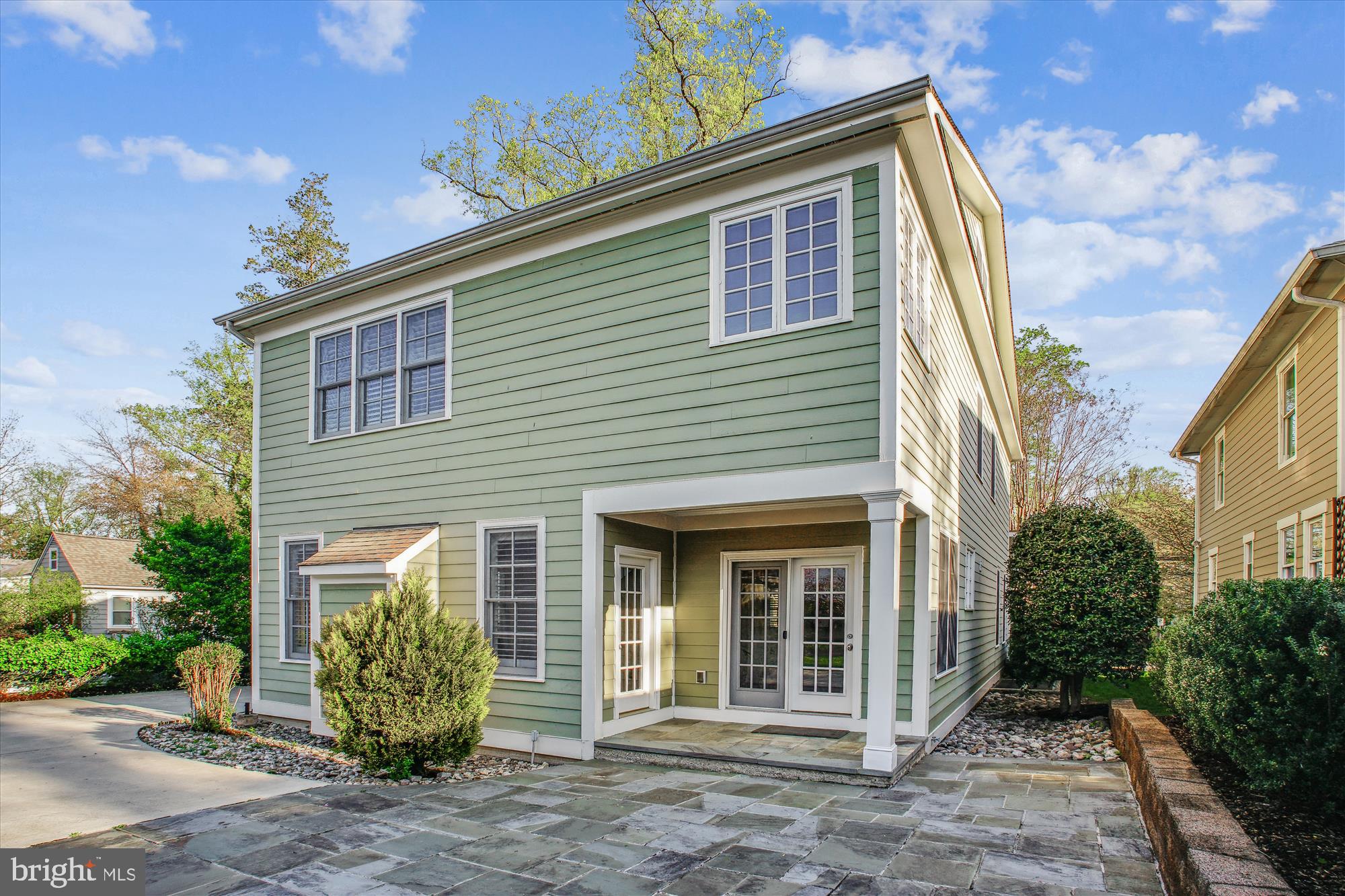 5512 Greentree Road Bethesda, MD 20817 - Photo 64 of 75 a front view of a house with garden