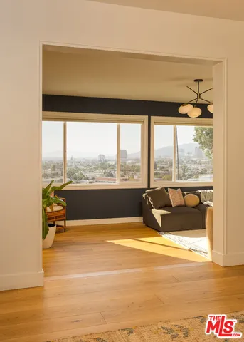 a view of swimming pool with an outdoor seating