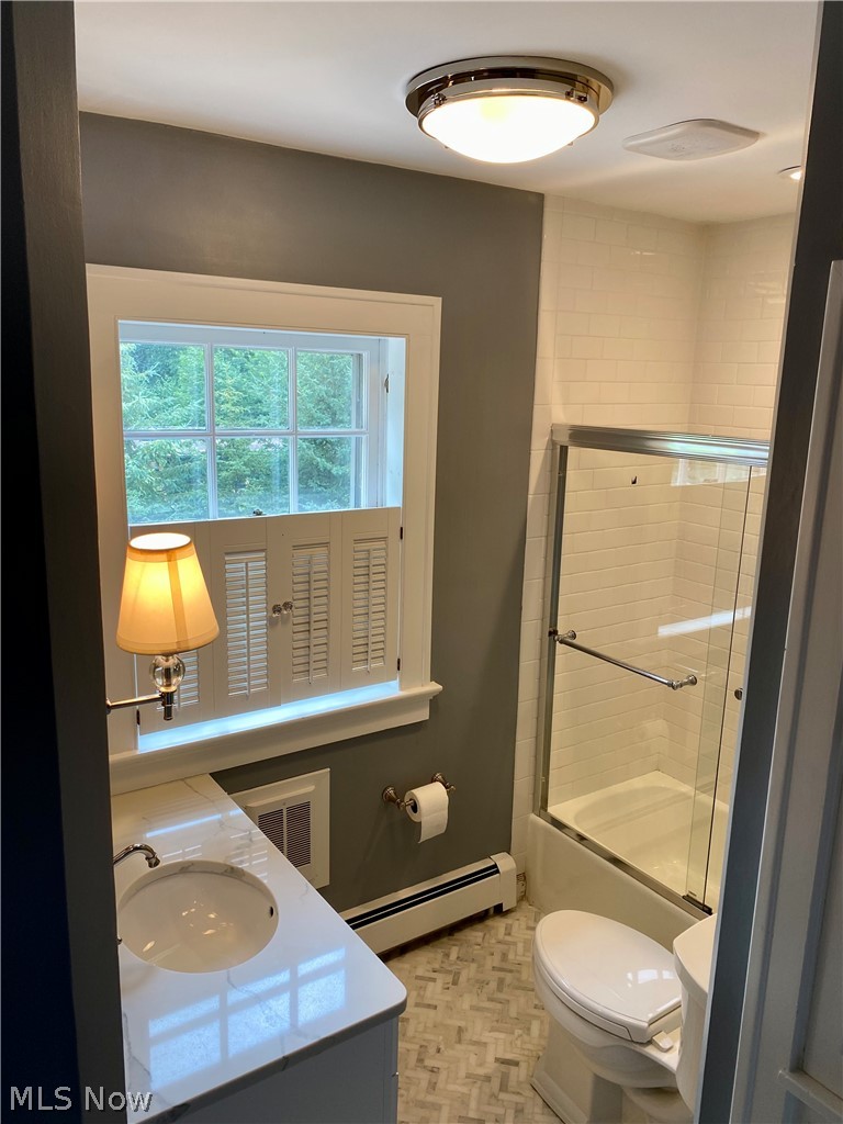 1984 Stockbridge Road Akron, OH 44313 - Photo 24 of 35 The en suite bath has a tub/shower combination, newer flooring, vanity and paint.