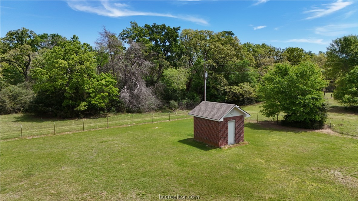 10432 Sammys Road Bremond, TX 76629 - Photo 28 of 47 a view of a garden with a house
