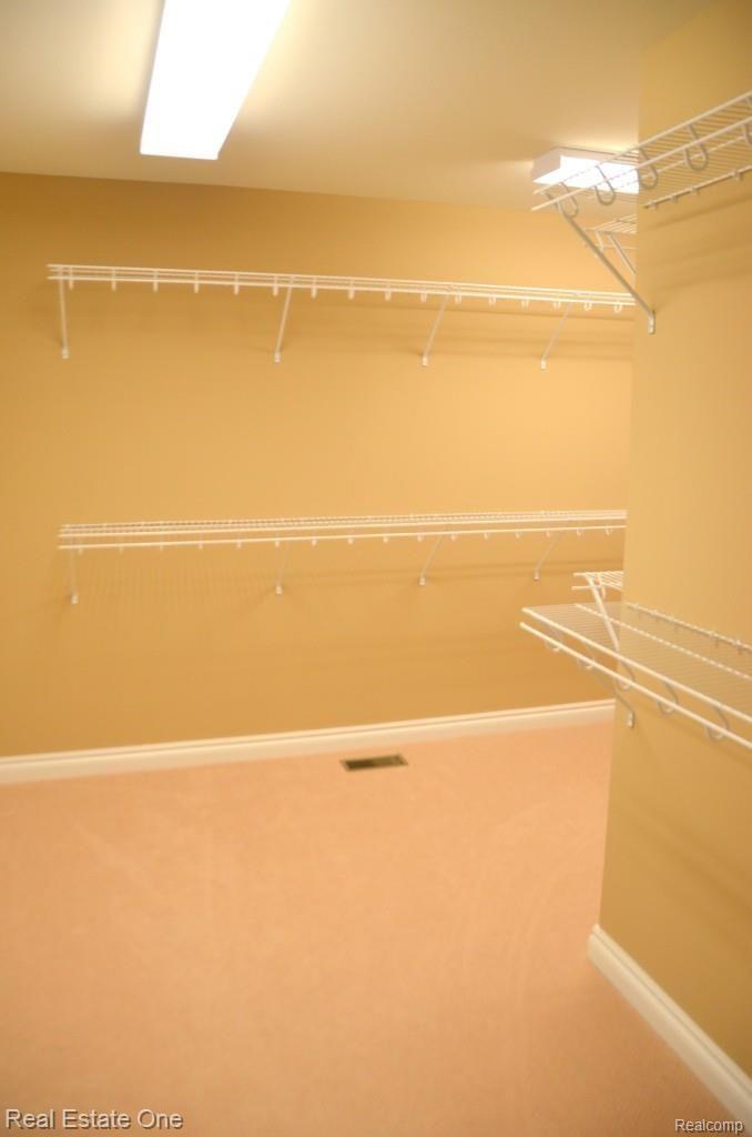 6918 Oakhurst Ridge Road Clarkston, MI 48348 - Photo 34 of 47 MASTER CLOSET