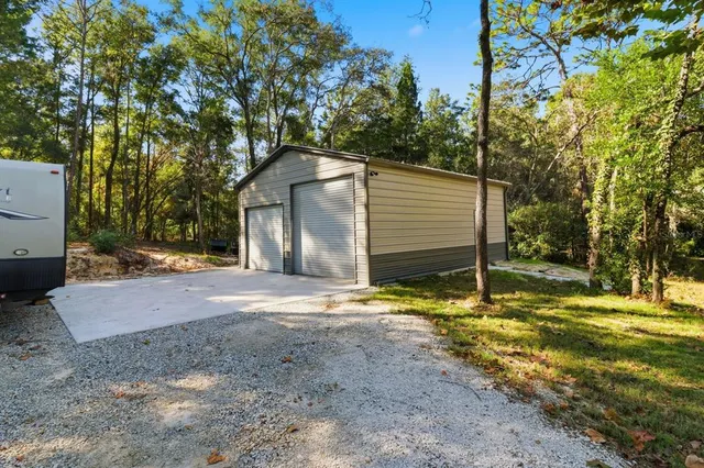 a view of back yard of the house