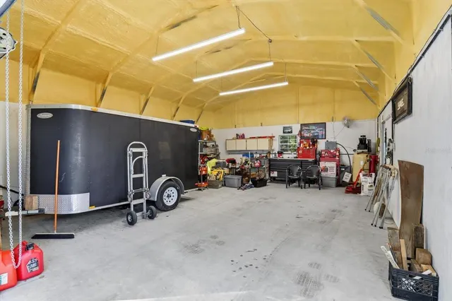 a view of parking garage with cars