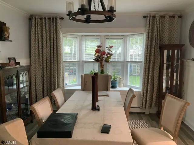 a bedroom with a bed and a mirror