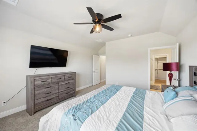 a bathroom with double sink and a mirror